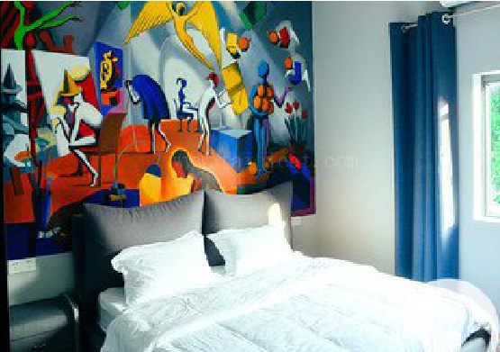 宣恩对于酒店的墙体彩绘而言更注重哪些方面？